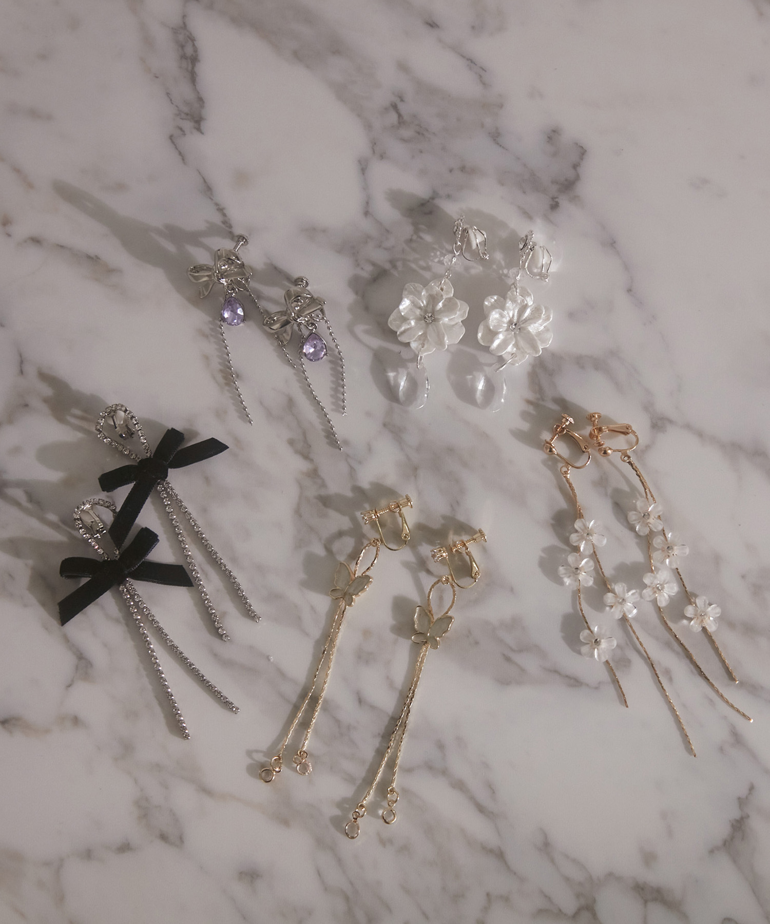 SELECT ビジューリボンイヤリング