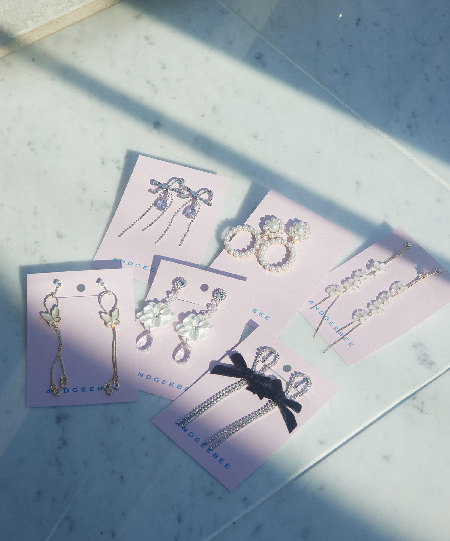 SELECT ビジューリボンイヤリング