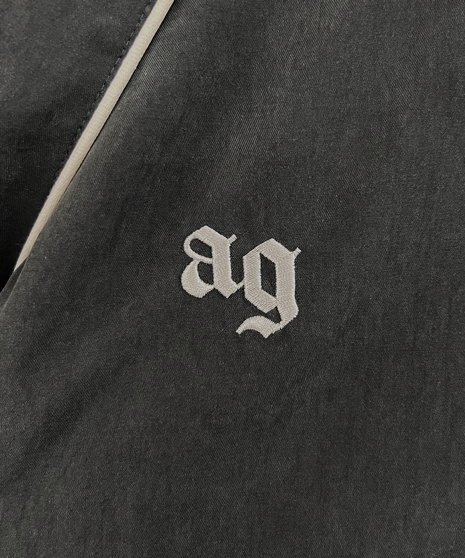 UNISEX パイピングトラックブルゾン