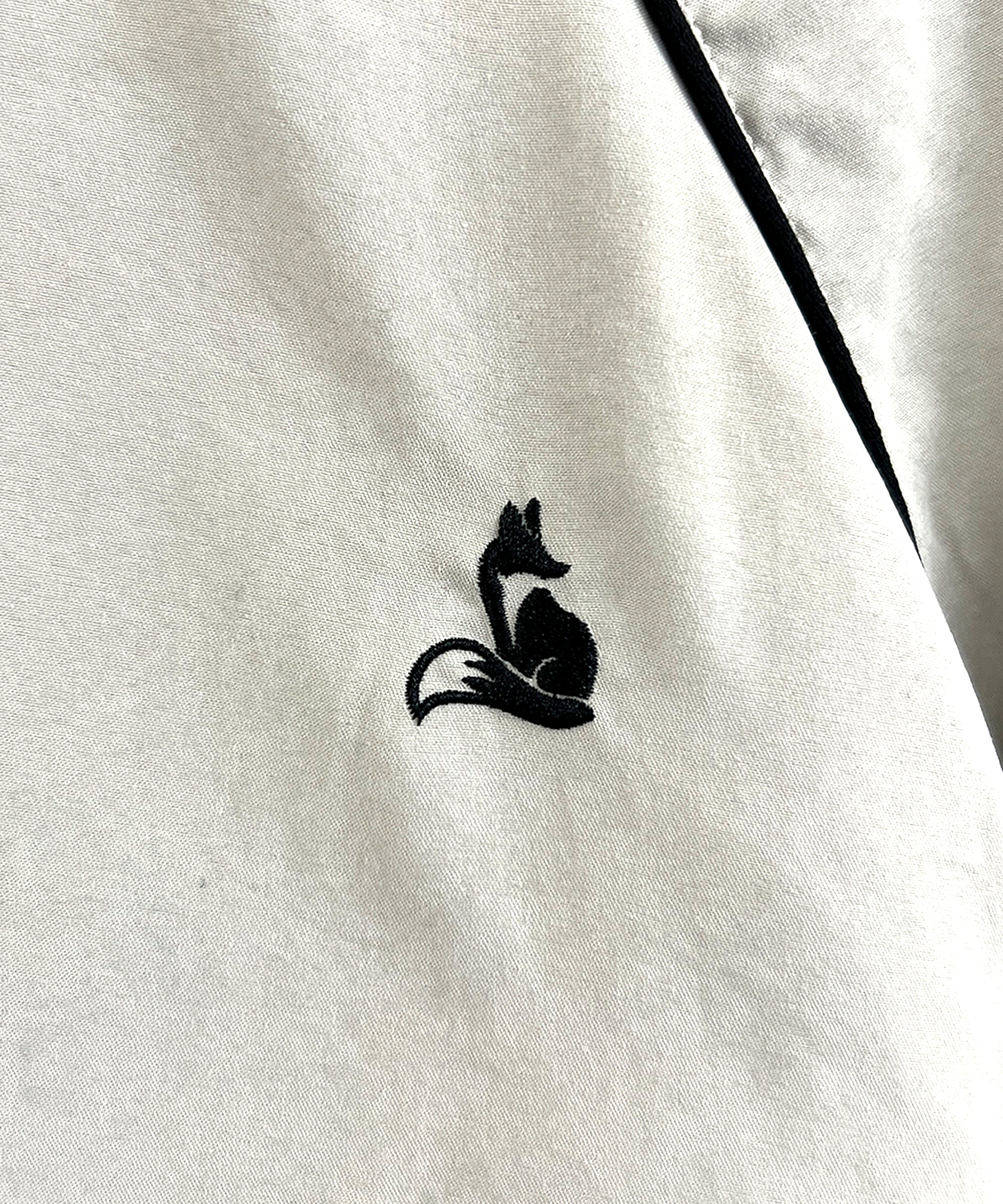 UNISEX パイピングトラックブルゾン