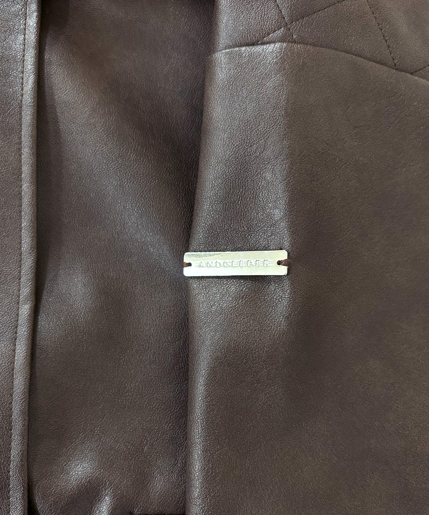 UNISEX フェイクレザーキルティングブルゾン