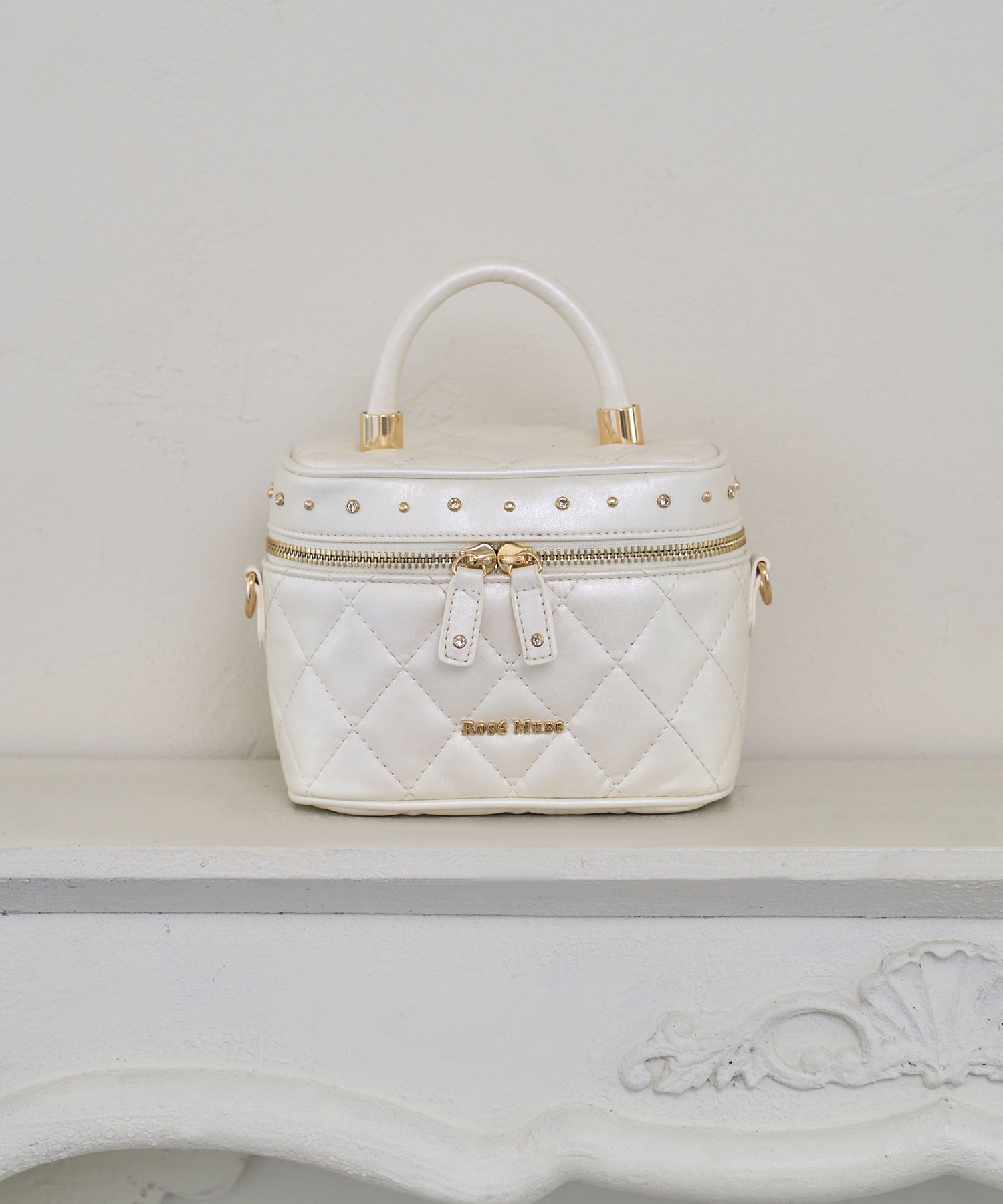 Mini vanity with detachable fur handle