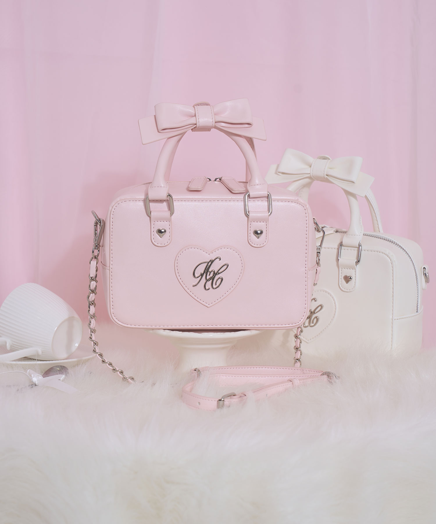 ハンドルリボンハートロゴバッグ