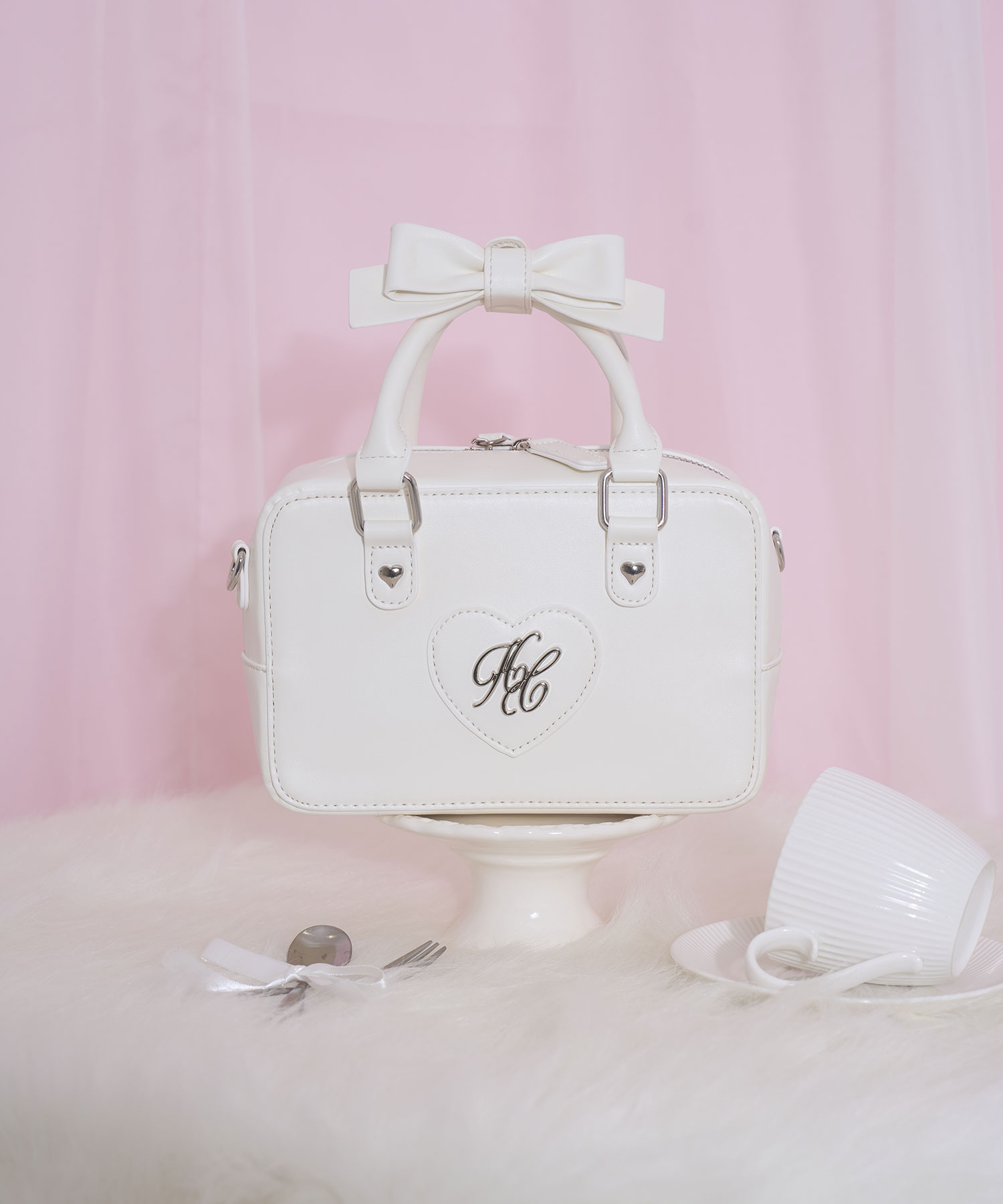 ハンドルリボンハートロゴバッグ