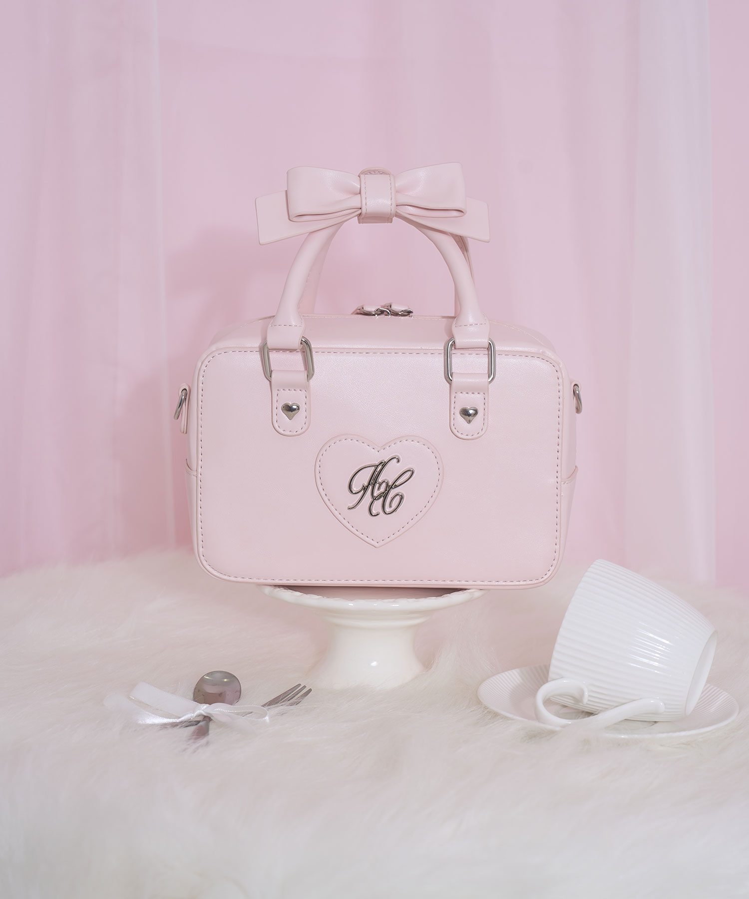 ハンドルリボンハートロゴバッグ