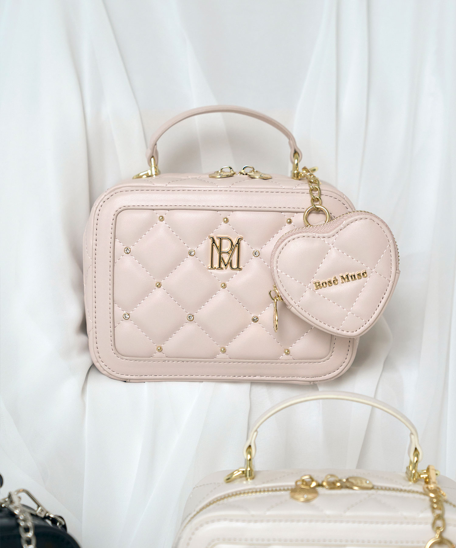 point vanity bag with heart pouch