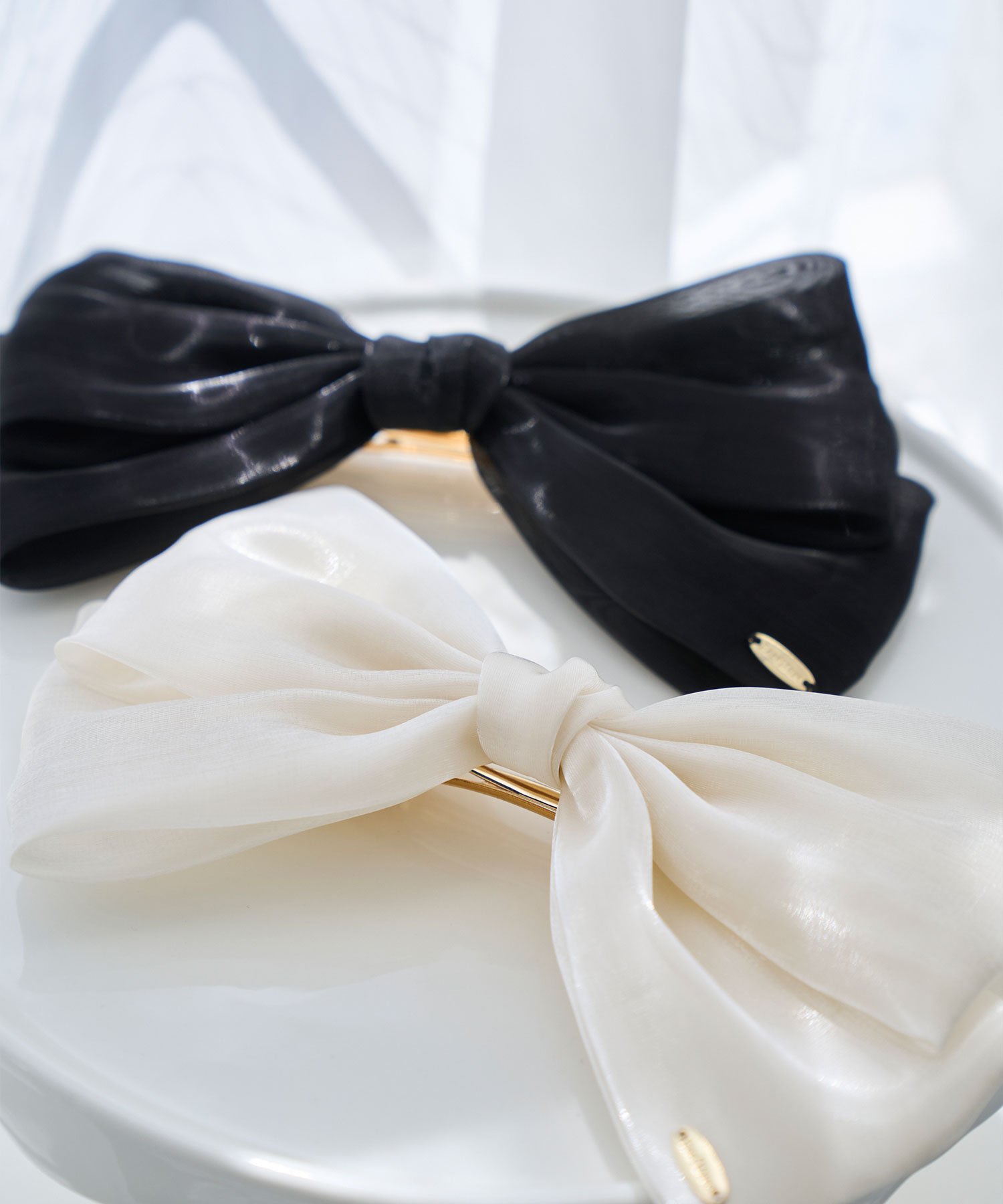 Shiny organ ribbon barrette