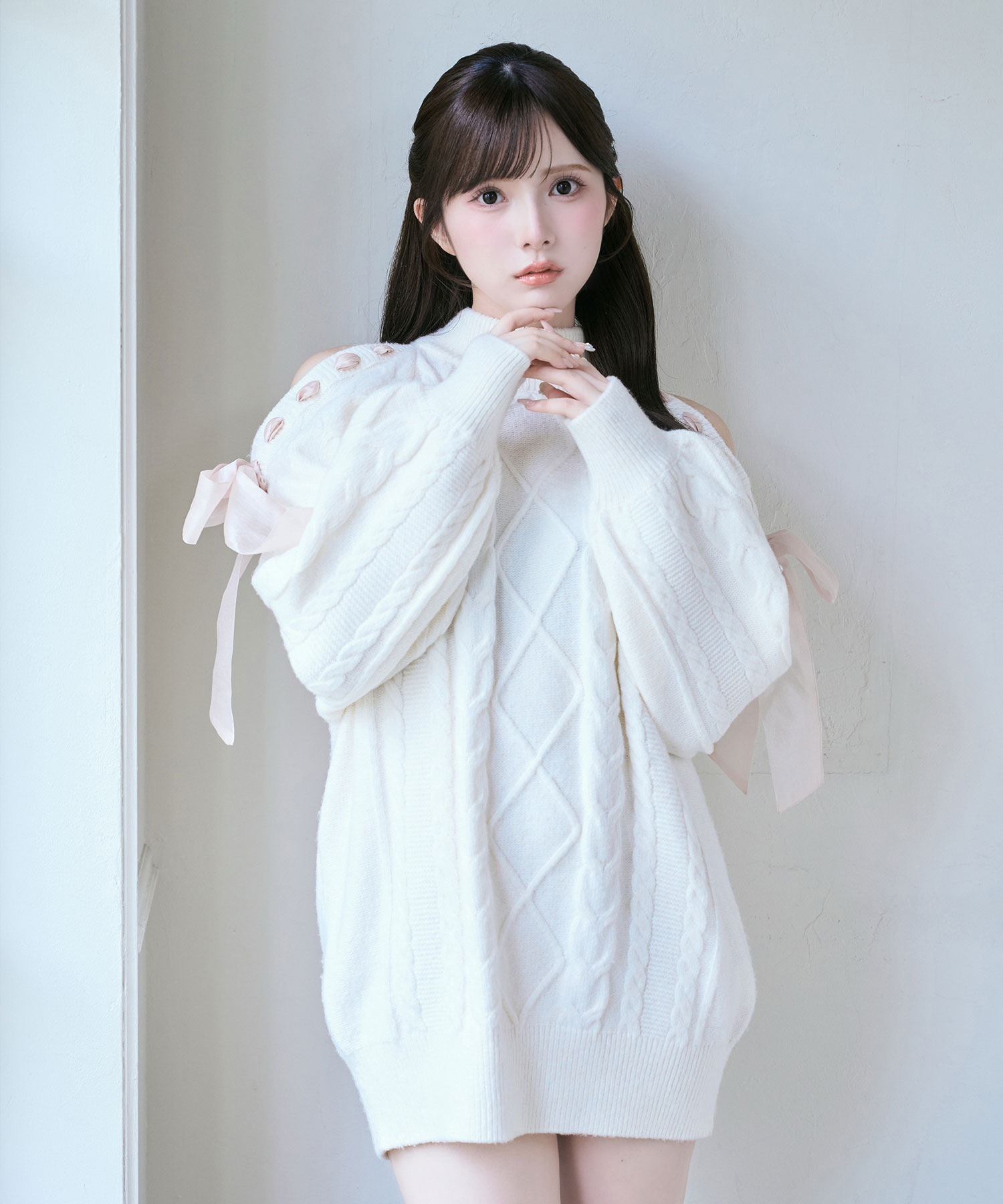 Cold shoulder ribbon cable knit