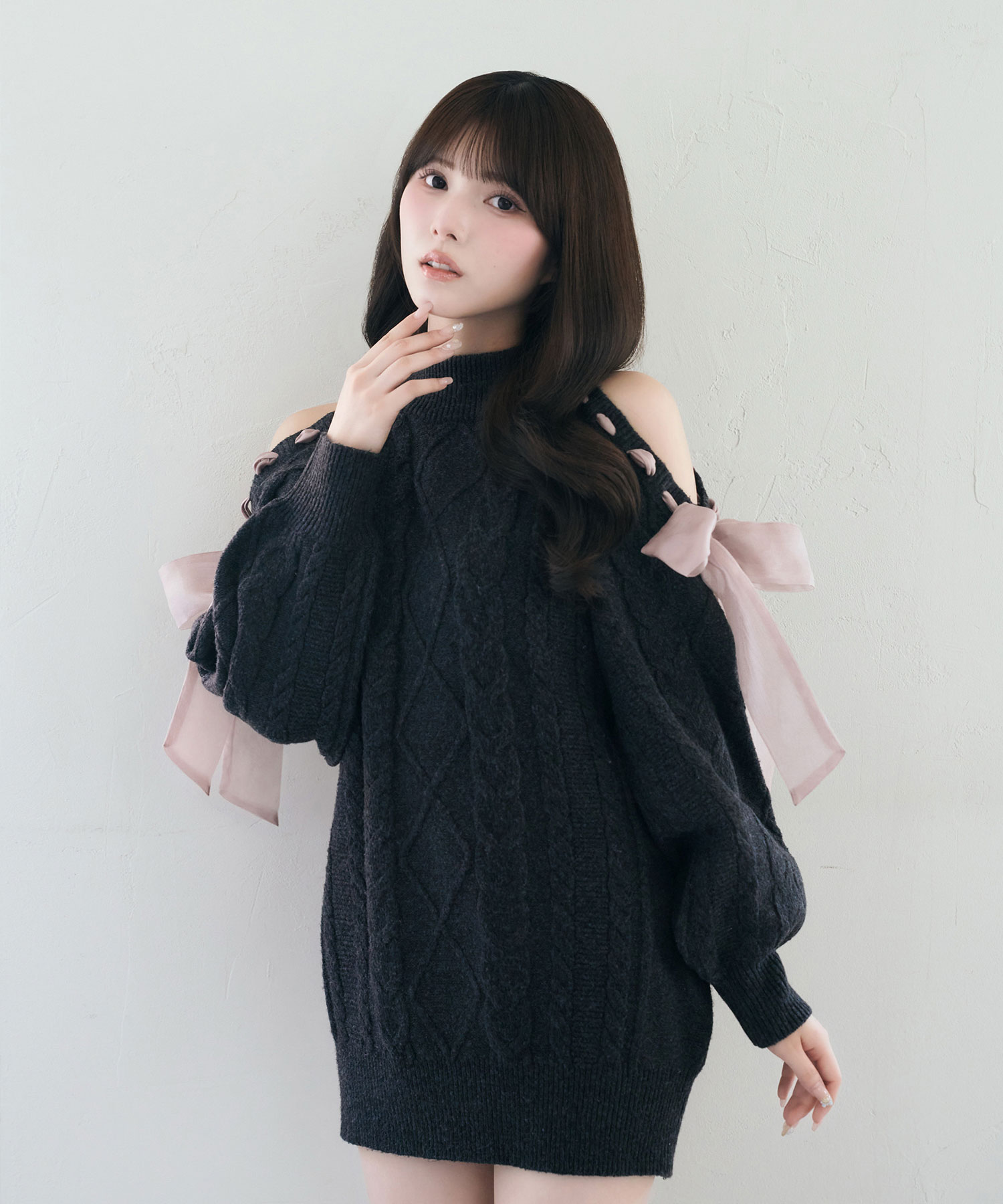 Cold shoulder ribbon cable knit