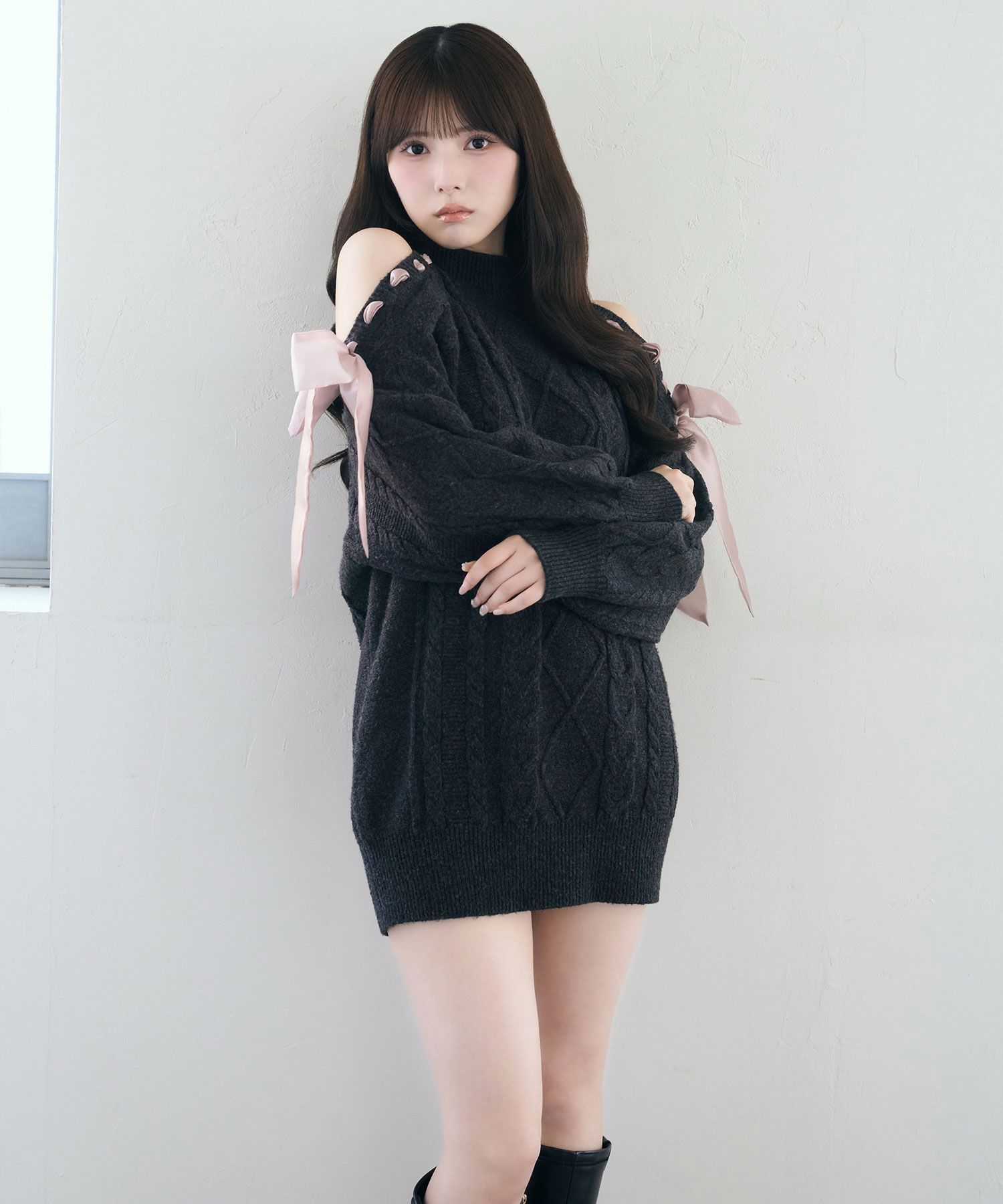 Cold shoulder ribbon cable knit