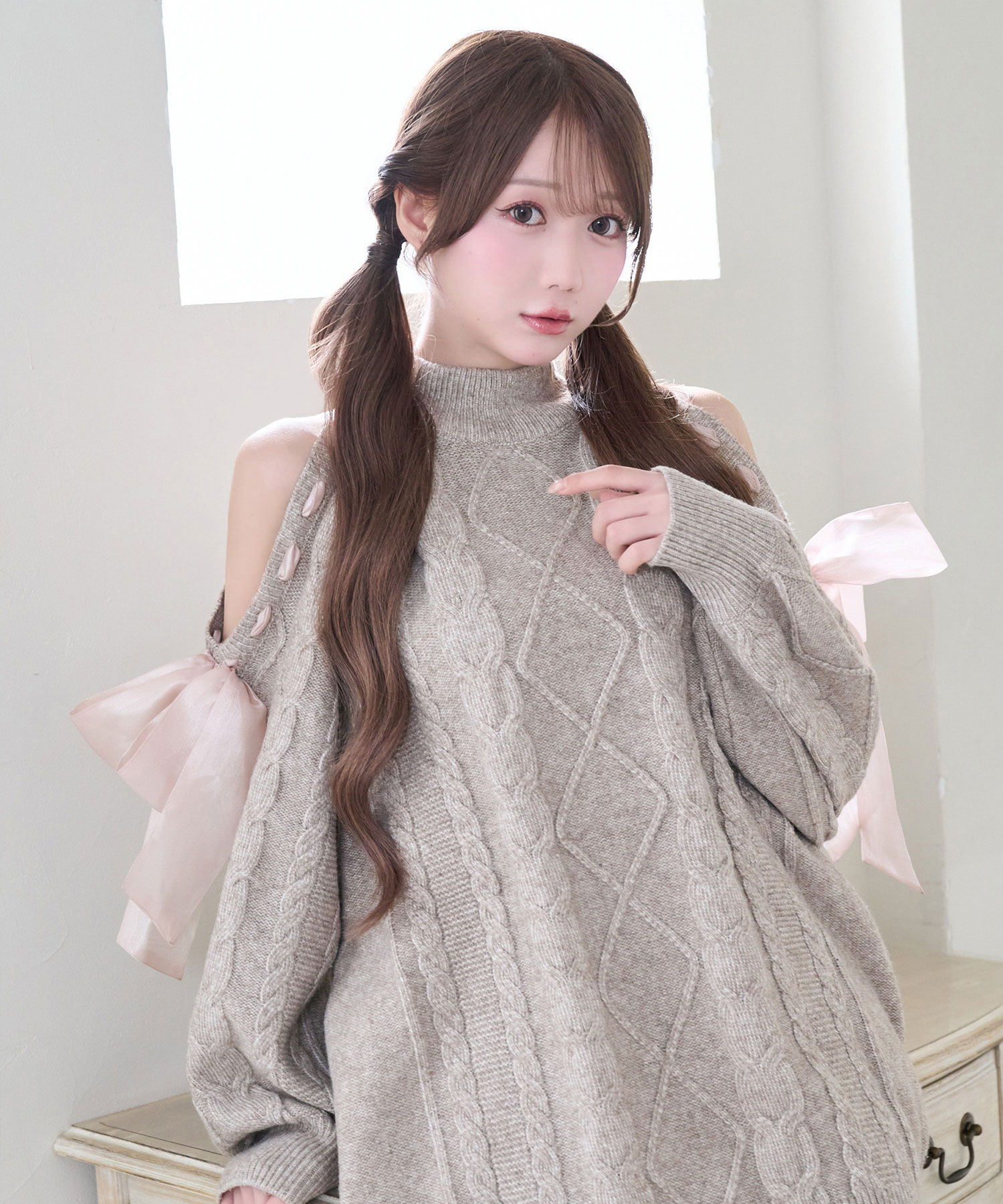 Cold shoulder ribbon cable knit