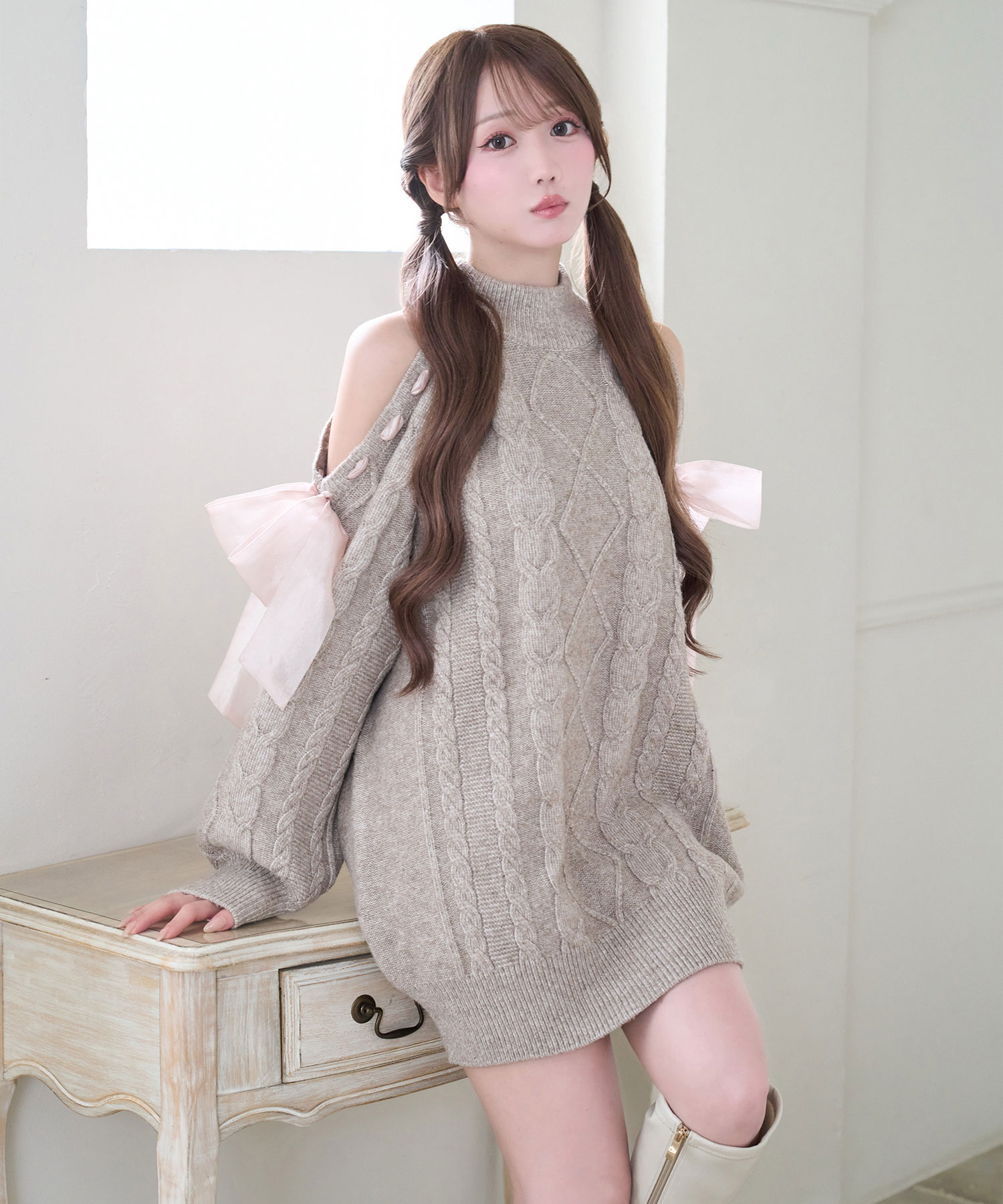 Cold shoulder ribbon cable knit