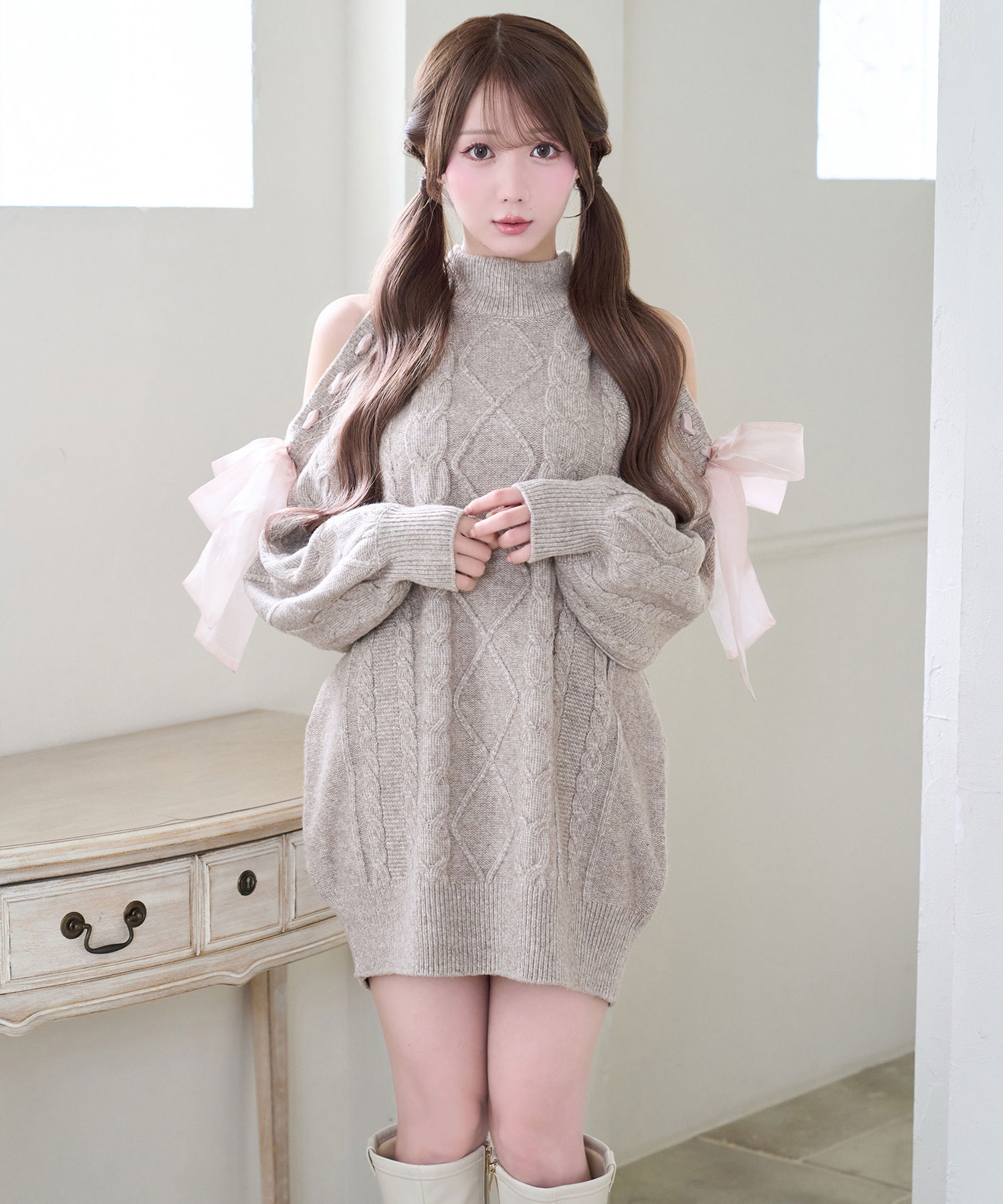 Cold shoulder ribbon cable knit