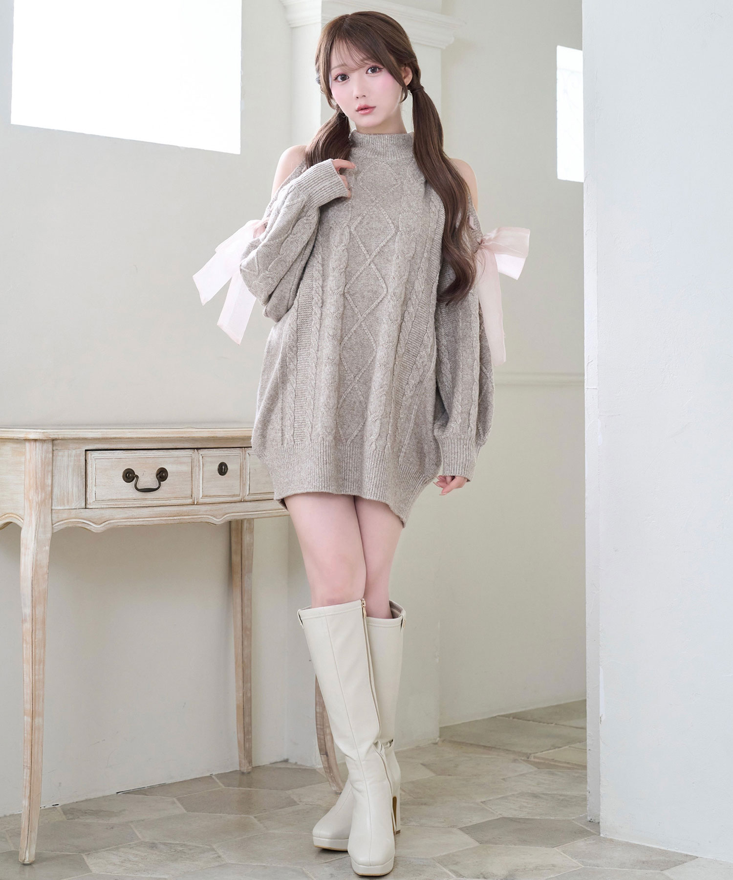 Cold shoulder ribbon cable knit